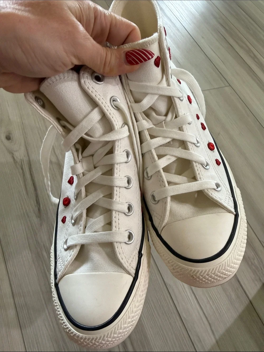 White High-Top Converse Sneakers with Red Heart Accents